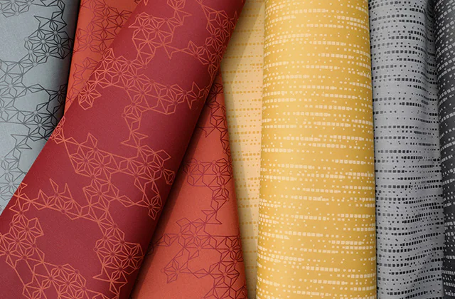 rolls of multi-colored jacquard fabric